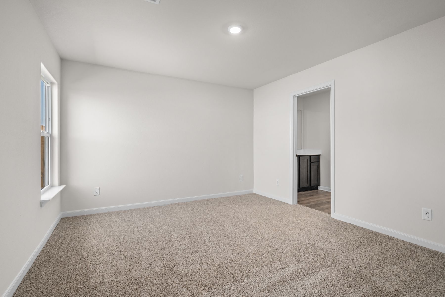 The master suite has a large bedroom, ensuite bathroom and walk-in closet.