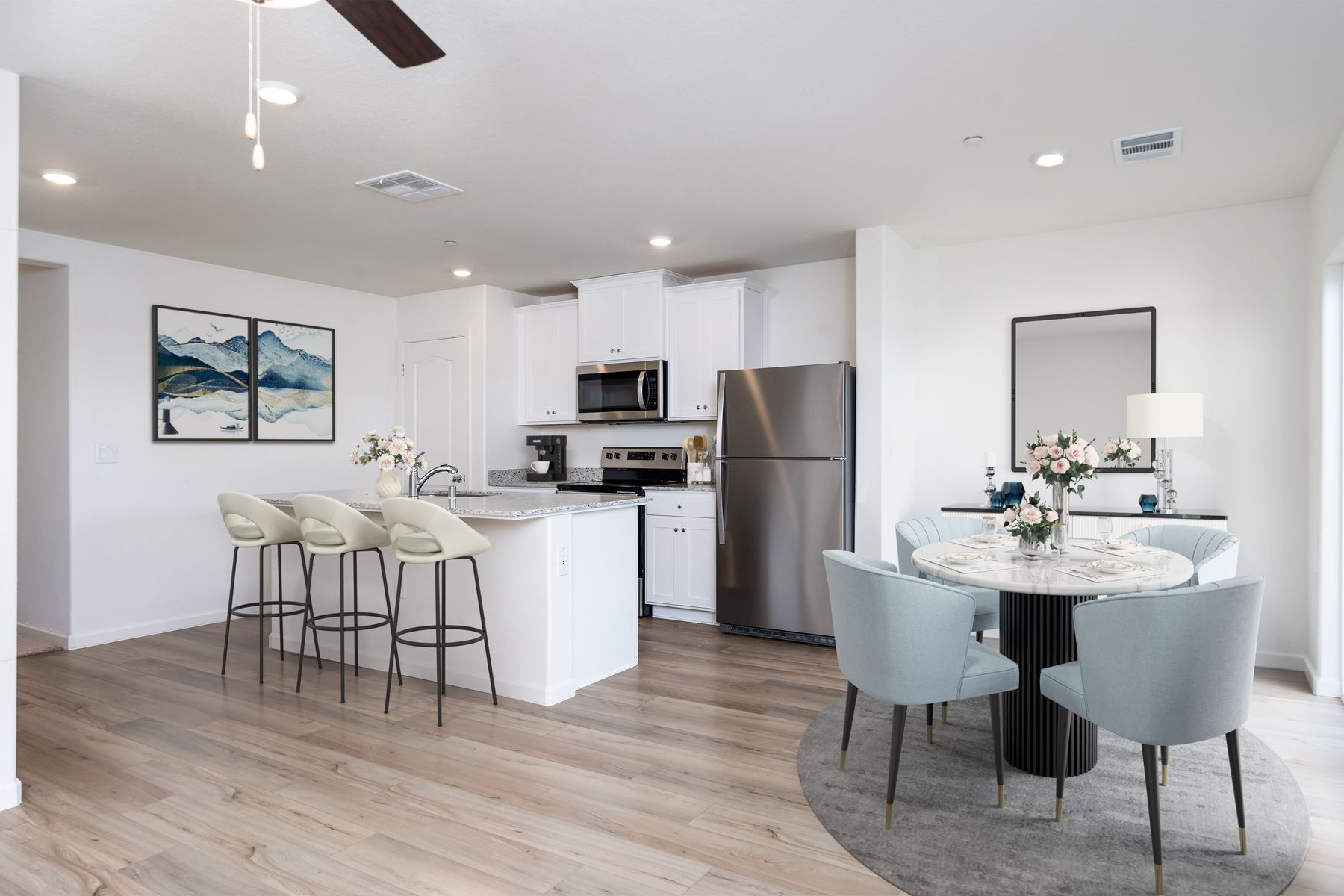 The dining room is off of the kitchen and open to the family room.