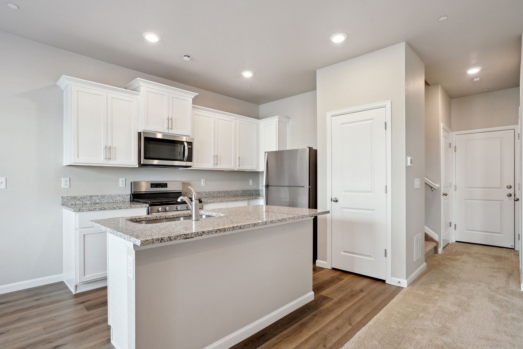 The kitchen appliances come included in this home.
