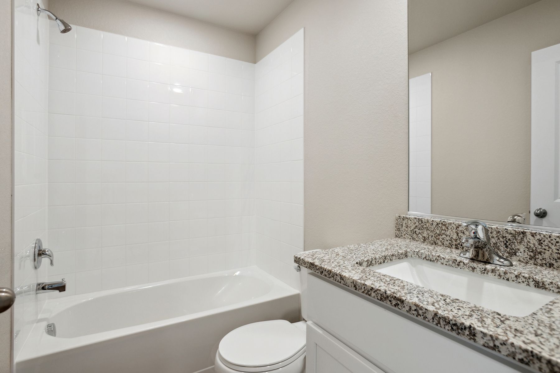 The secondary bathroom has the tub/shower combo.