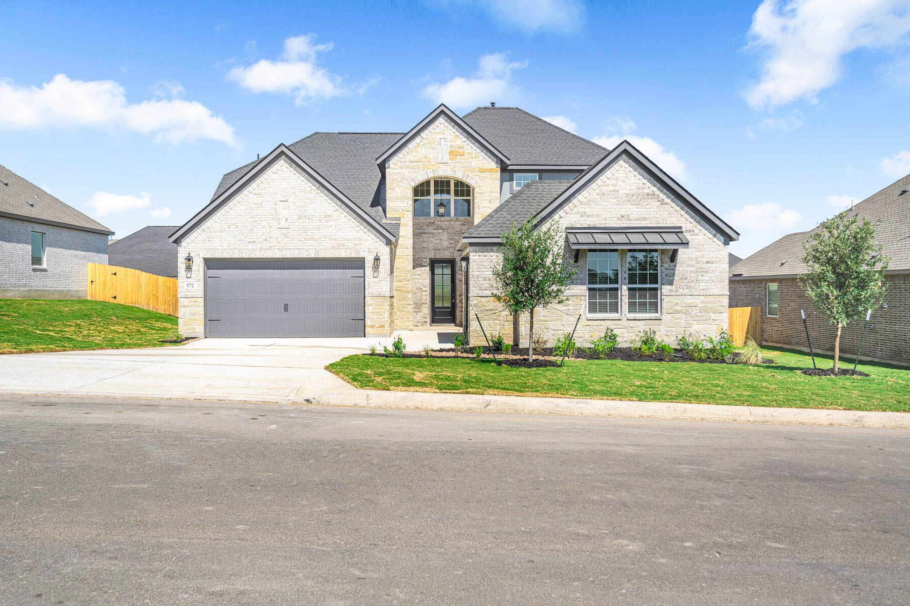 The Santos is a beautiful two-story home.