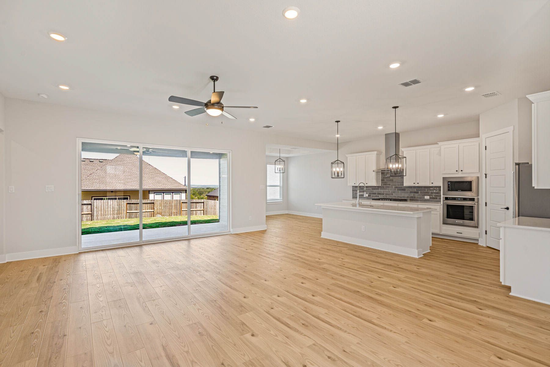 The Santos has an open floor plan that connects the kitchen, dining room and family room.
