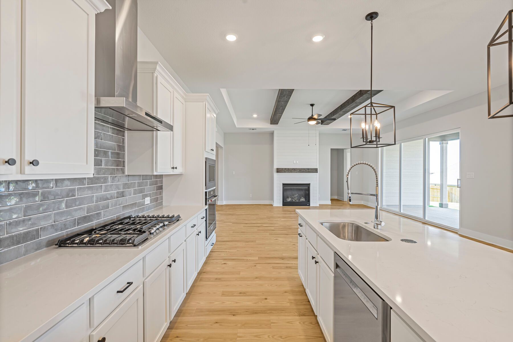 The kitchen has stainless steel appliances.