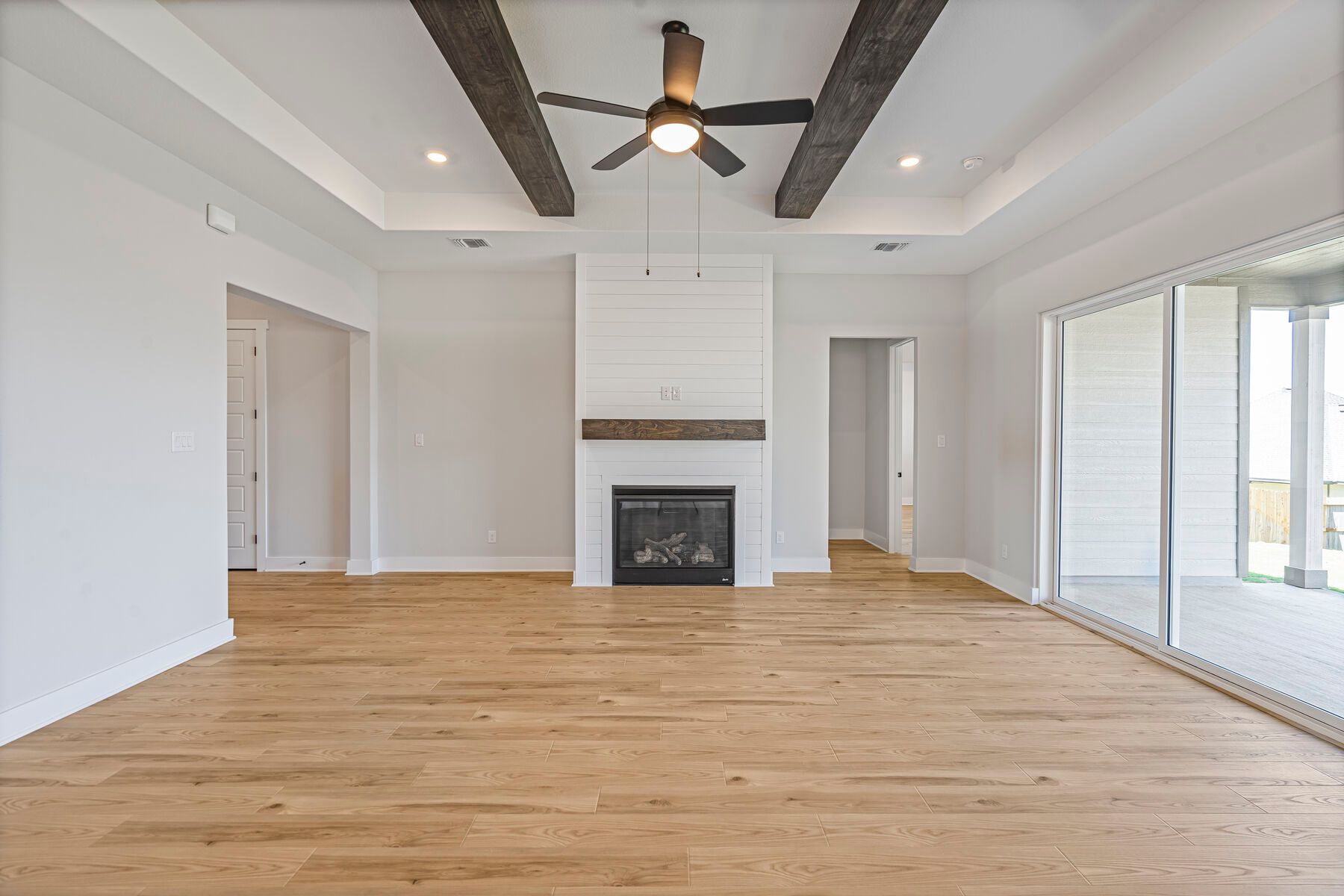 The family room has an electric fireplace.