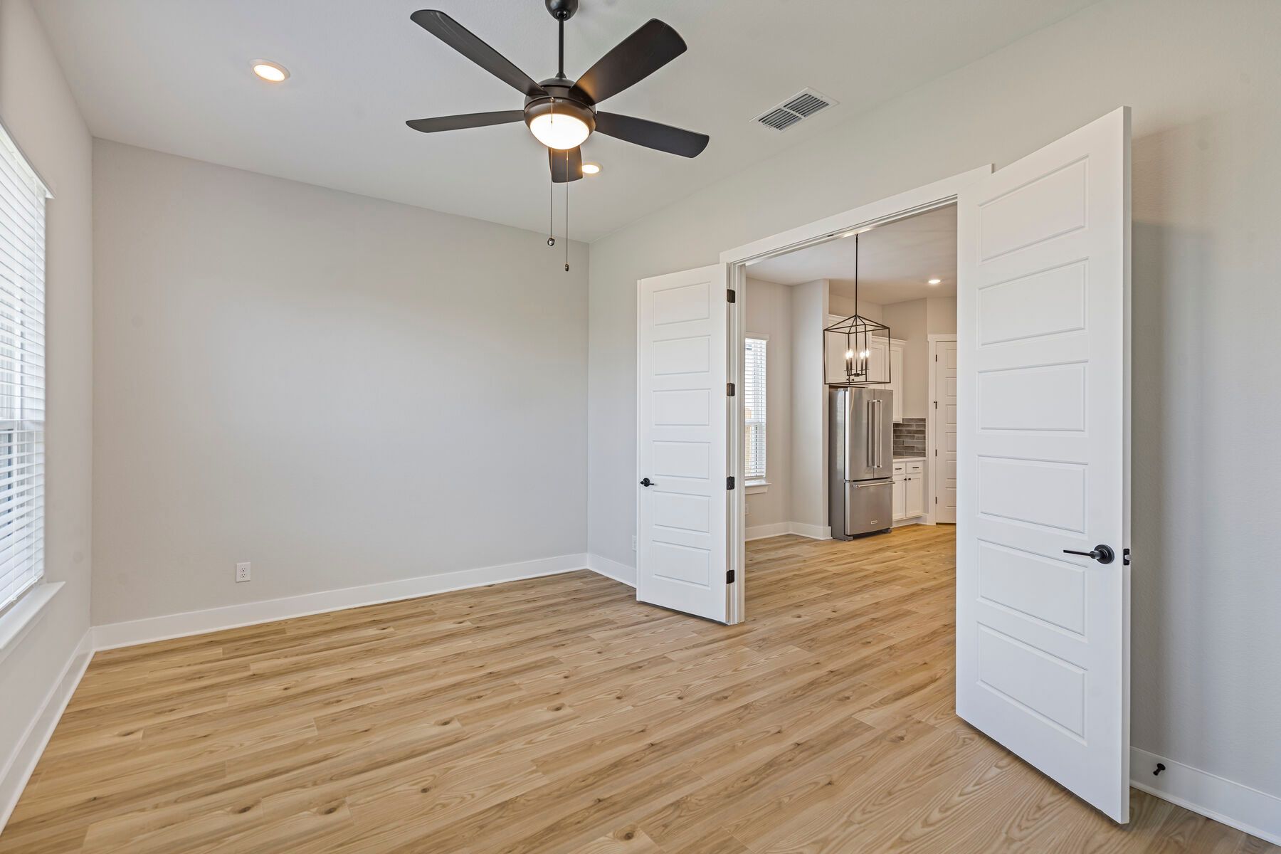 The flex room sits right off of the kitchen and dining room.