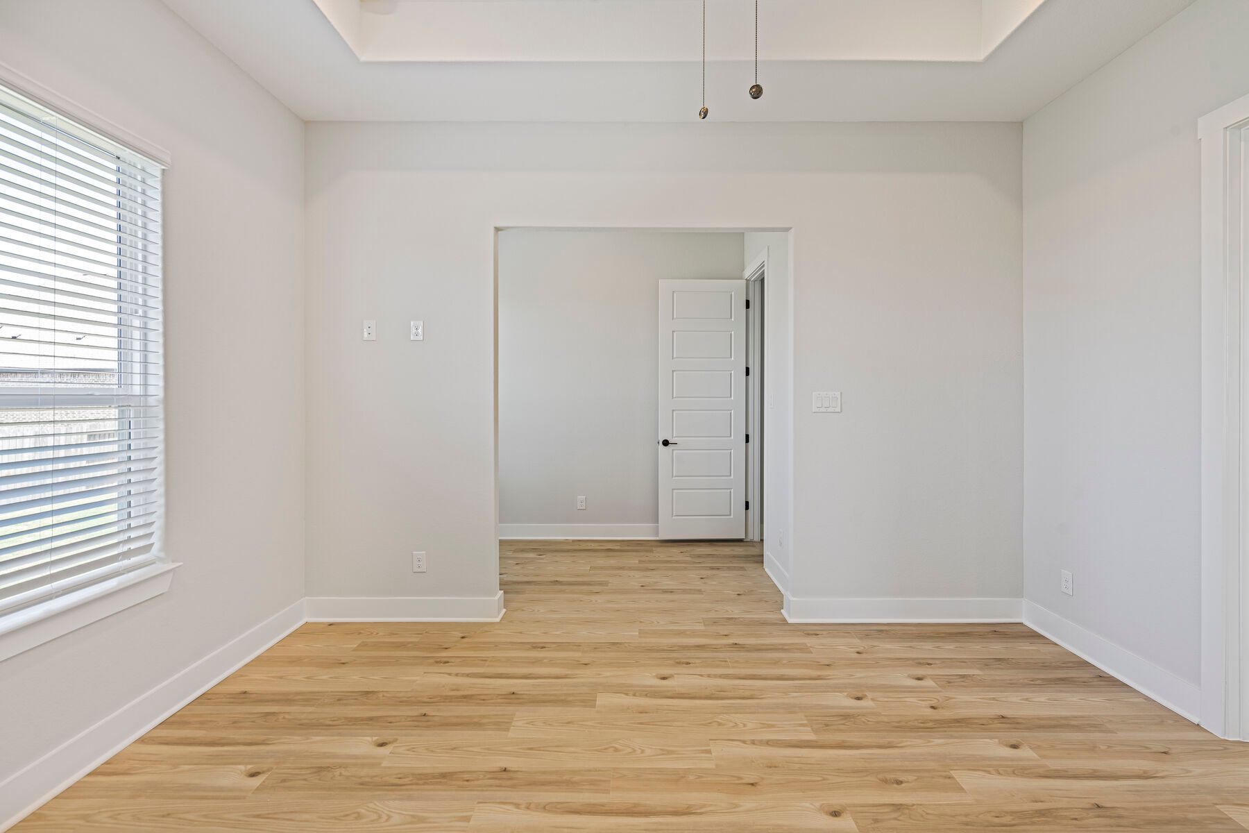 The master bedroom has a large bedroom and sitting area.