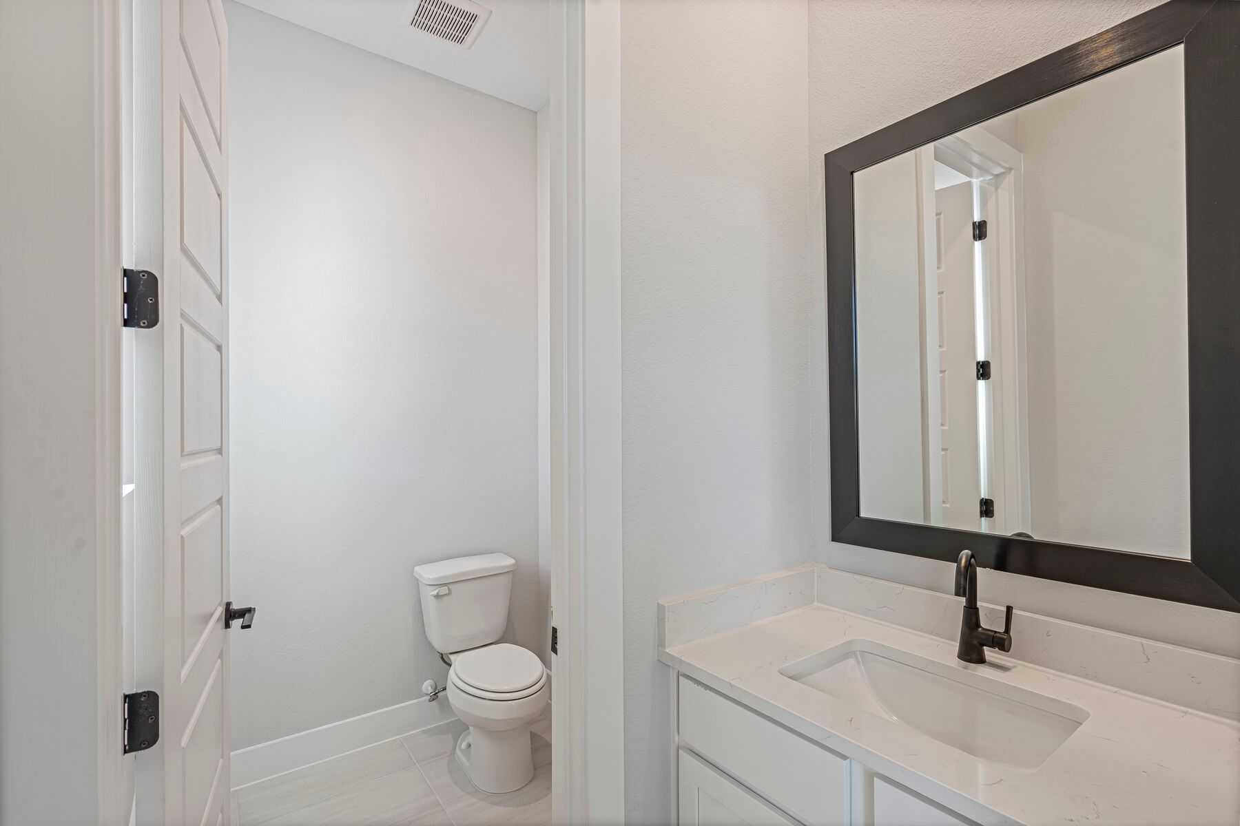 There is a Jack-and-Jill bathroom that connects two of the secondary bedrooms.