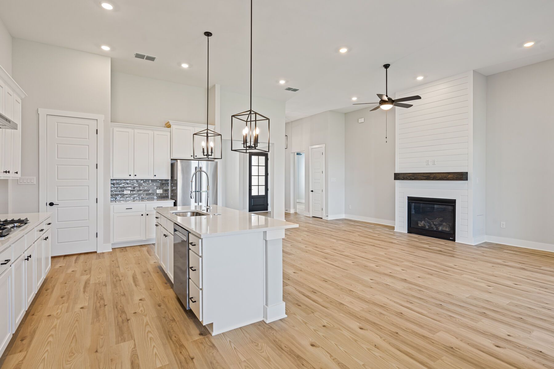 The living room sits right off of the kitchen.