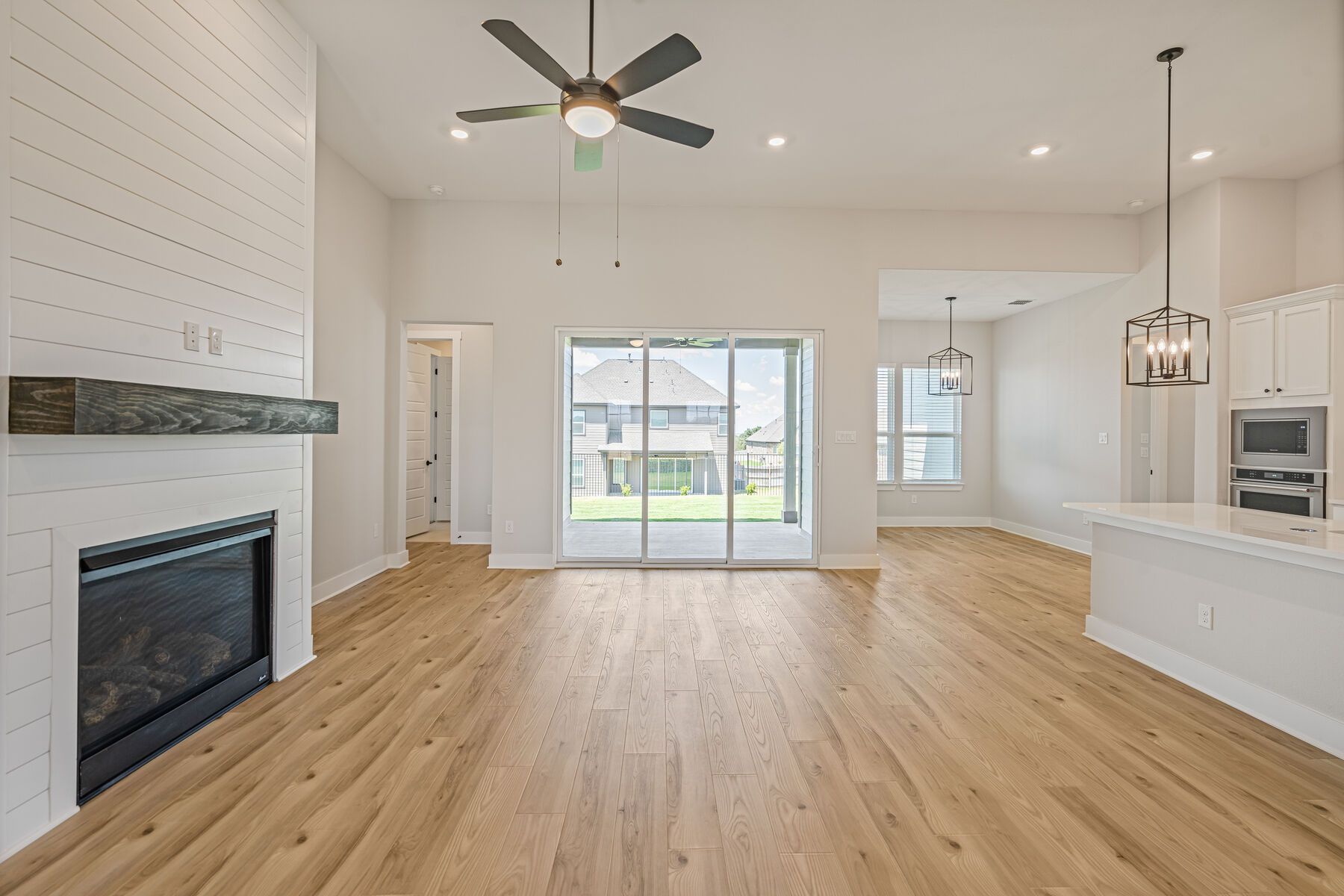 The family room has an electric fireplace. 