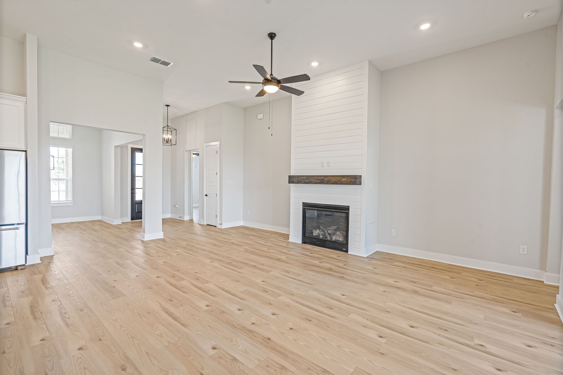 The living room has plenty of space for large furniture.