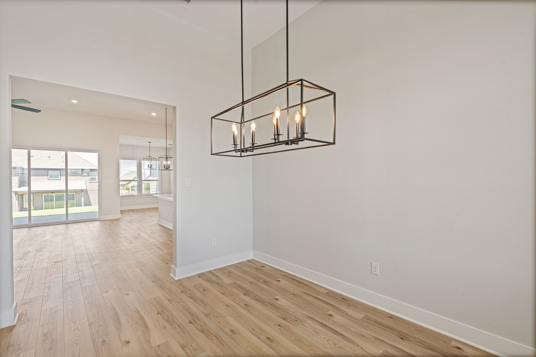 The dining room sits off of the family room and kitchen.