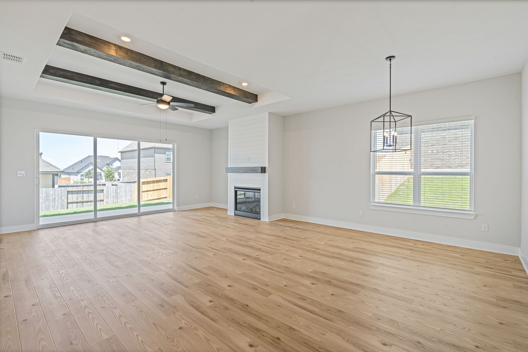 The family room has an electric fireplace.
