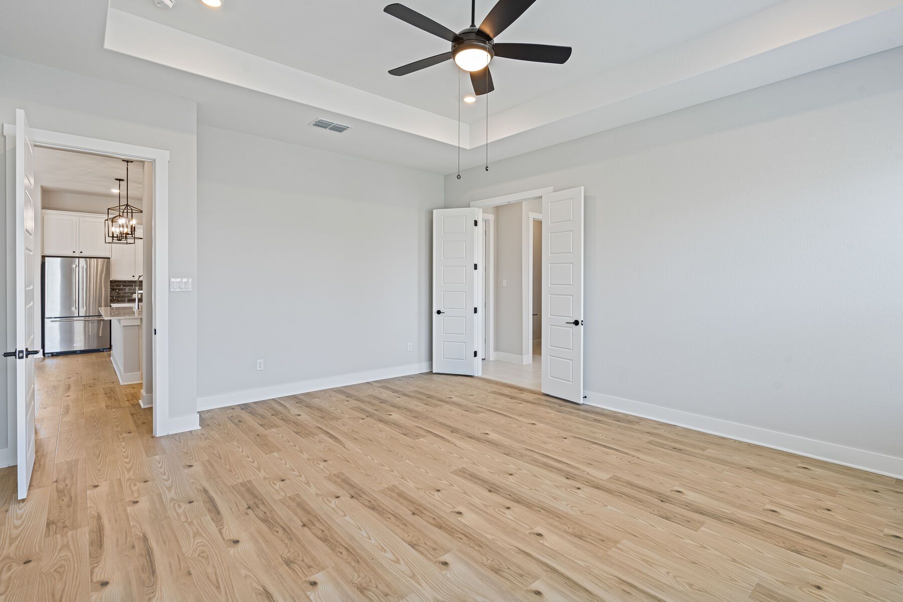 The master bedroom has plenty of room for king-sized furniture.