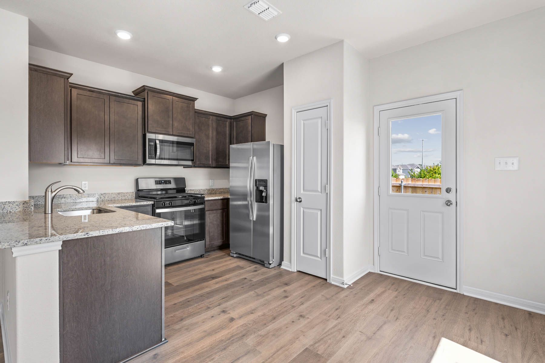 The kitchen has a pantry for additional storage.