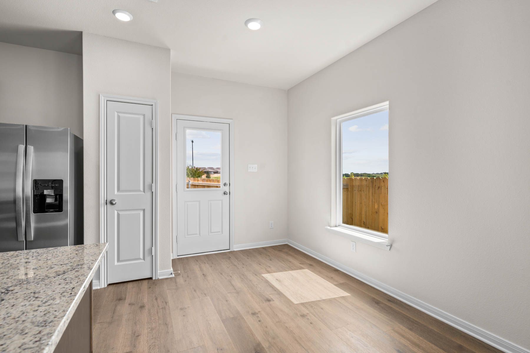 The dining area sits adjacent to the kitchen.