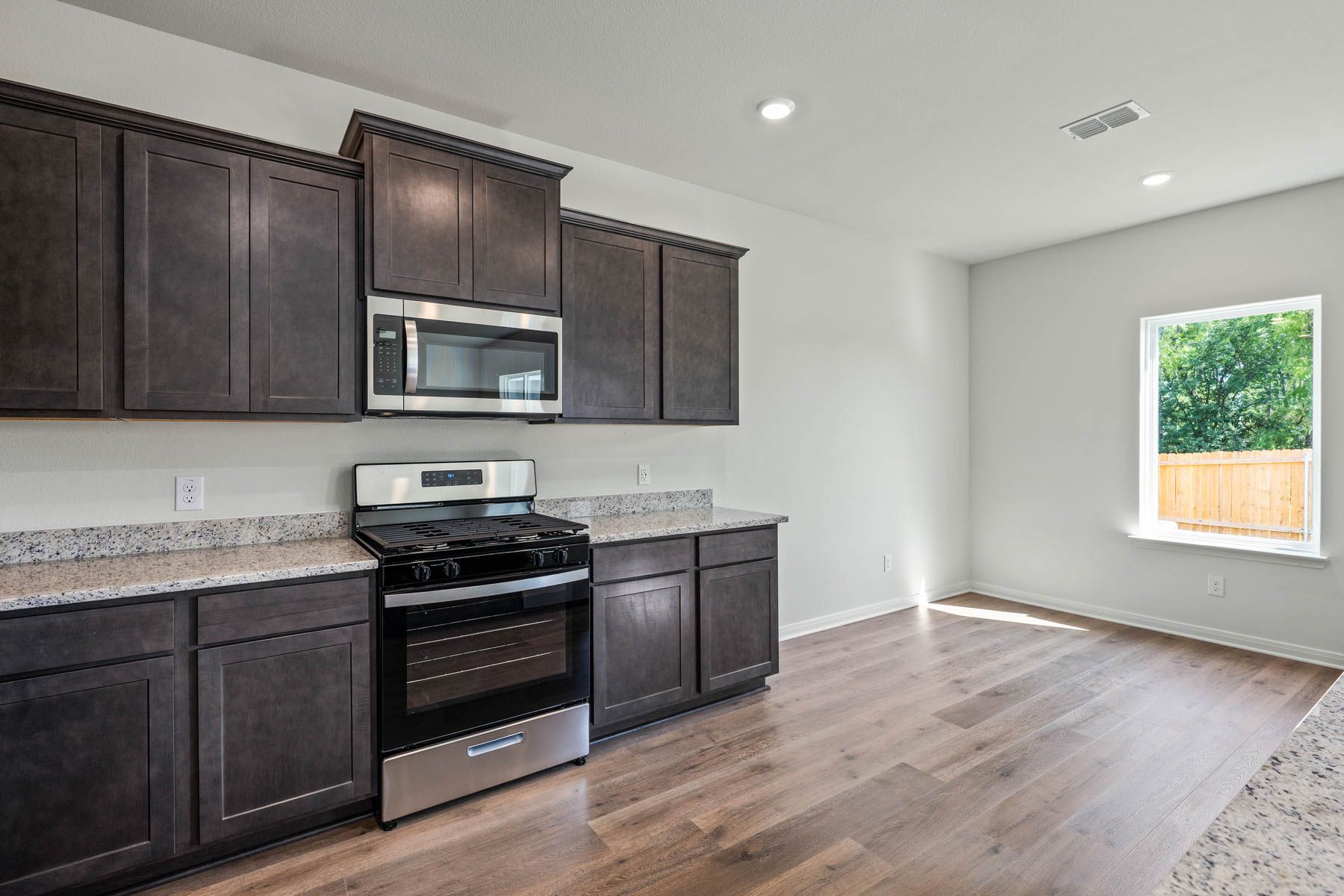 The dining room sits adjacent to the kitchen.