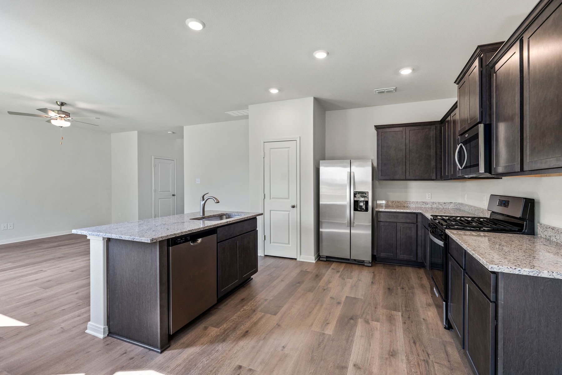 The kitchen has stainless-steel appliances.