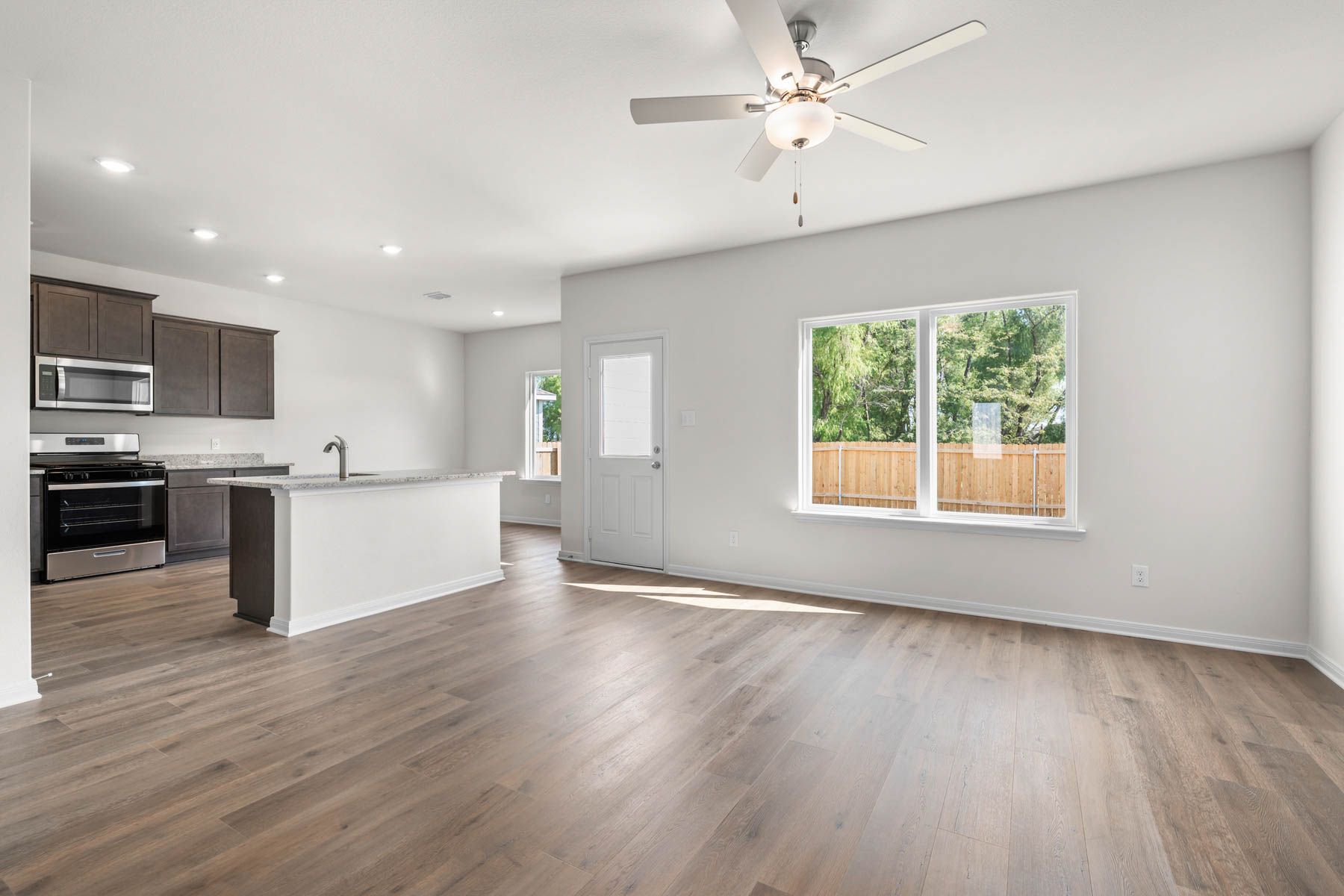 The living room sits adjacent to the kitchen.