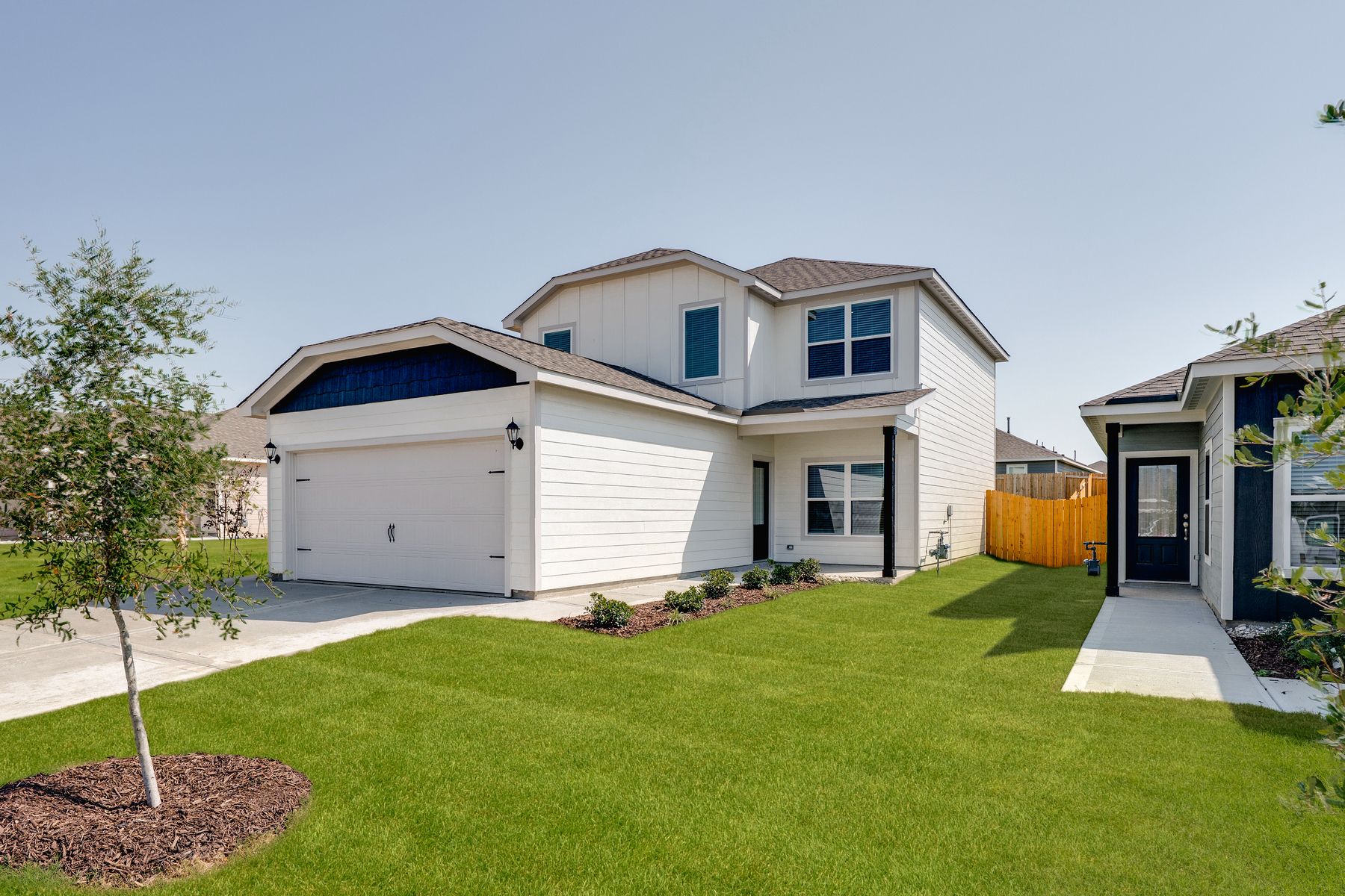 The Primrose has a gorgeous white siding exterior.