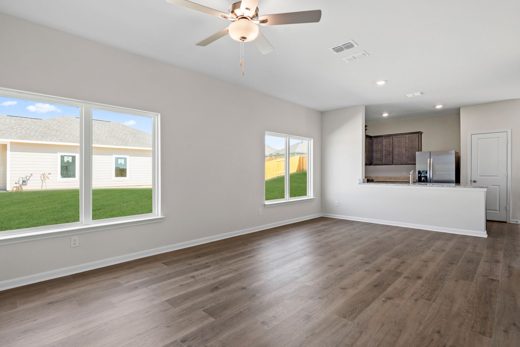 The family room has two large windows that let in great, natural light.
