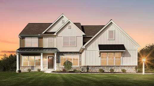 Exterior of the Kingston New Home in The Meadows at Colonial Club in Harrisburg with a Side Entry Garage