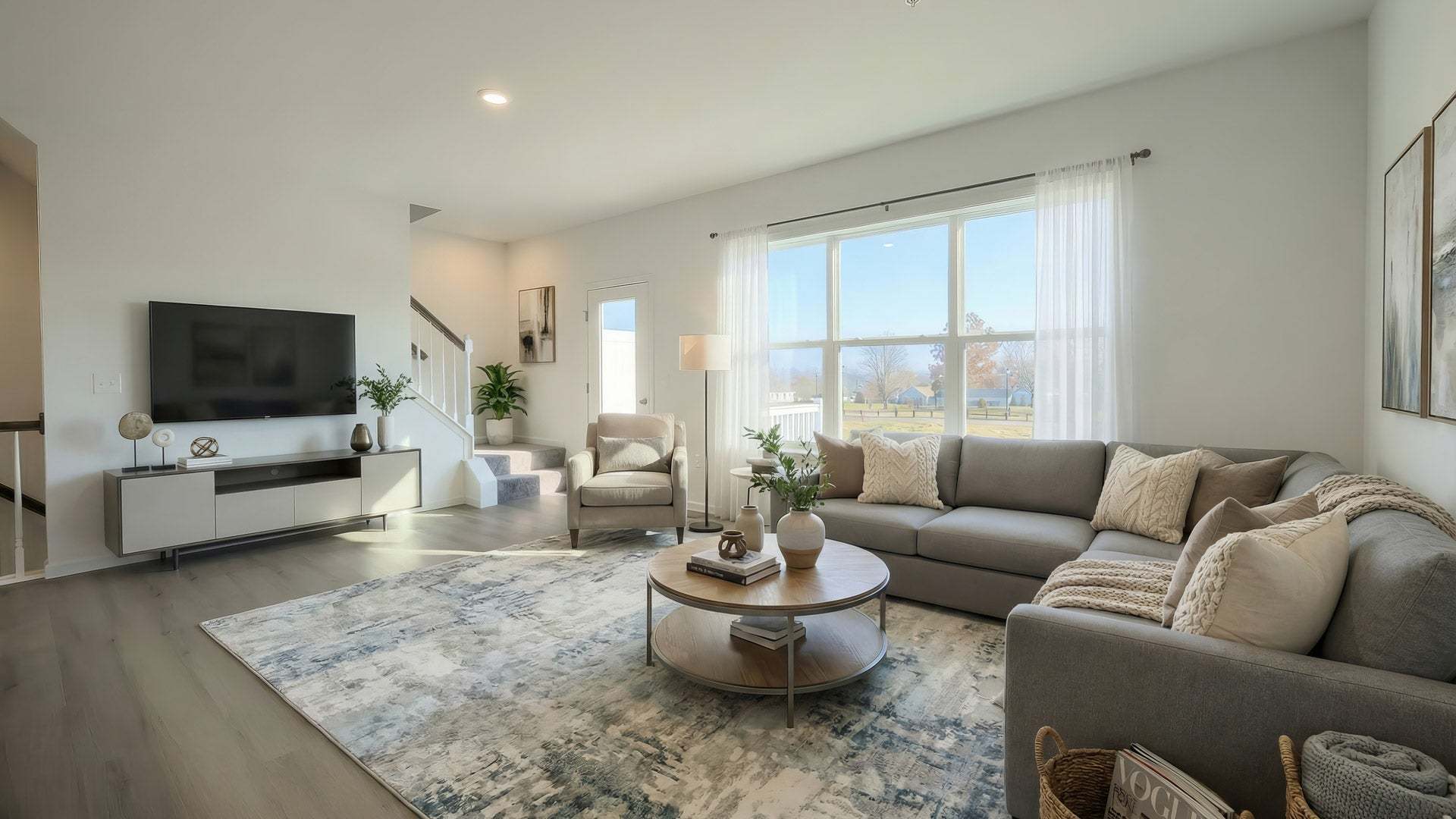 Living Room in New Townhome by Landmark Homes