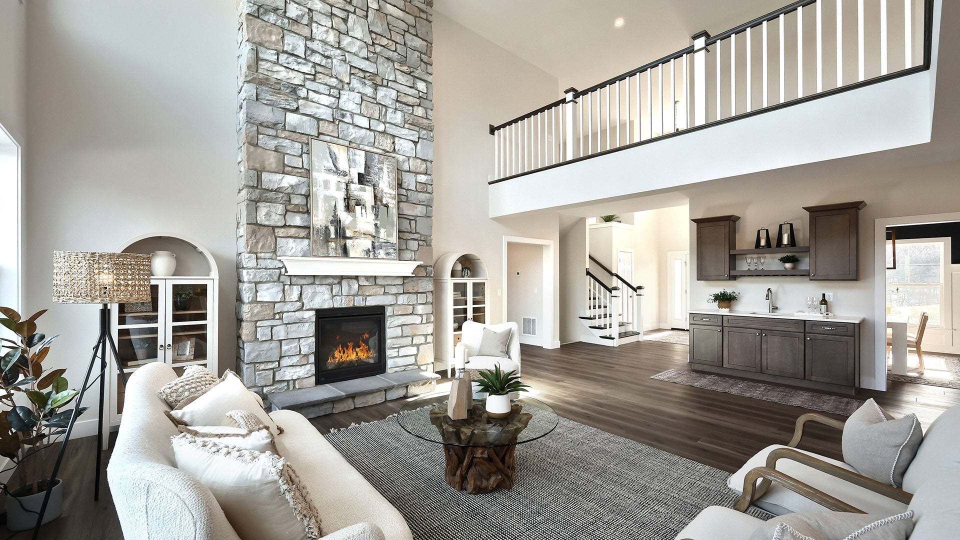 Sullivan Home Plan 2-Story Great Room with Floor to Ceiling Stone Surround