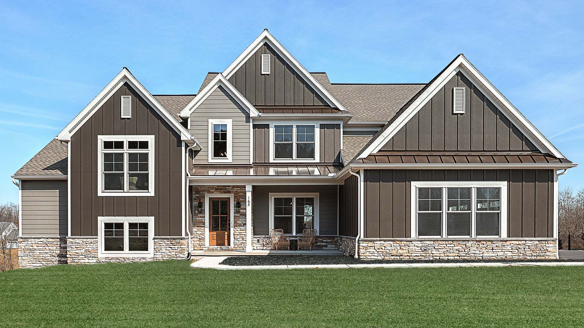 Sullivan New Home Exterior with Custom Details and Side Entry Garage