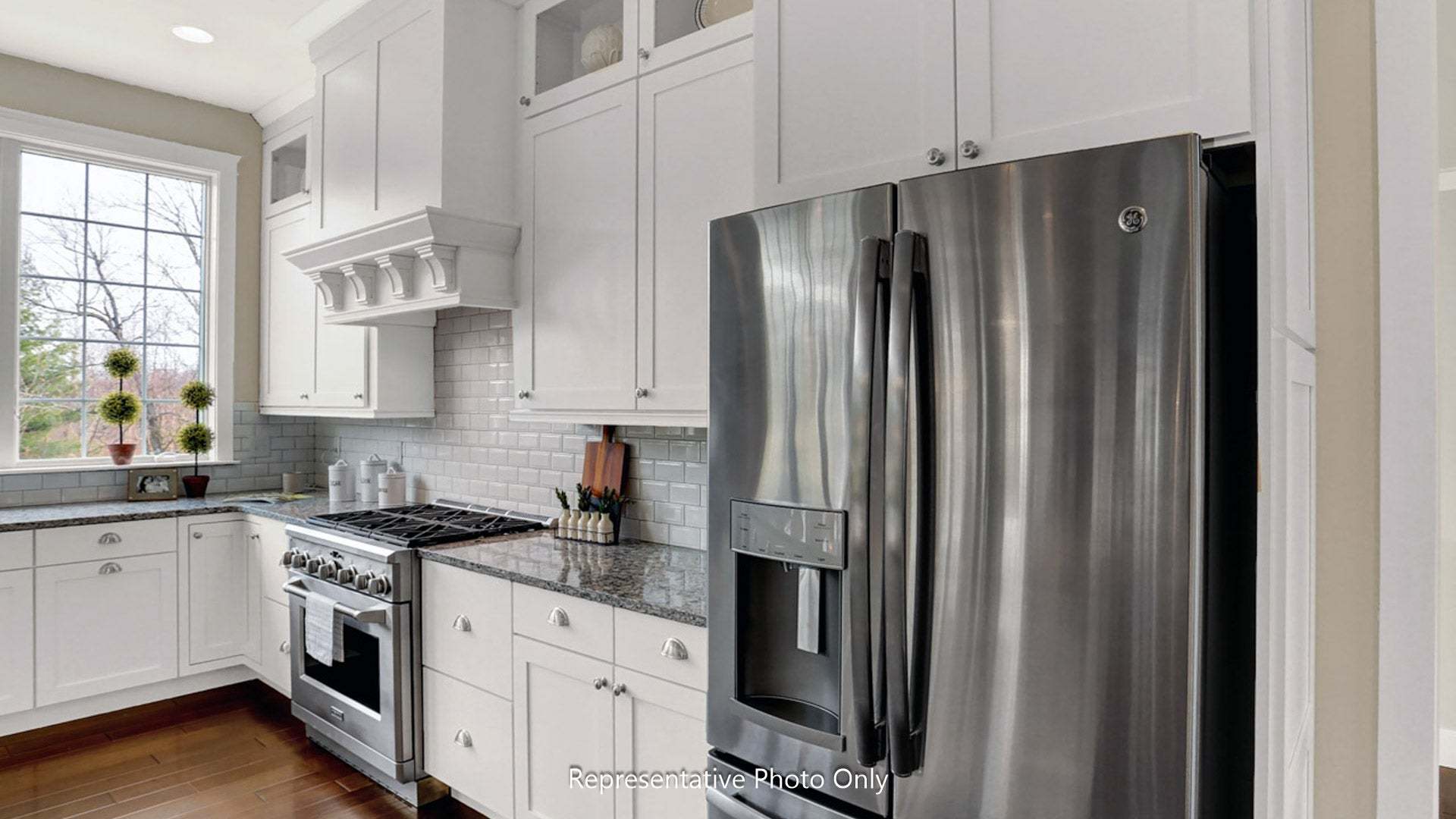 Tile Backsplash and Quartz Counter Tops in the Kitchen