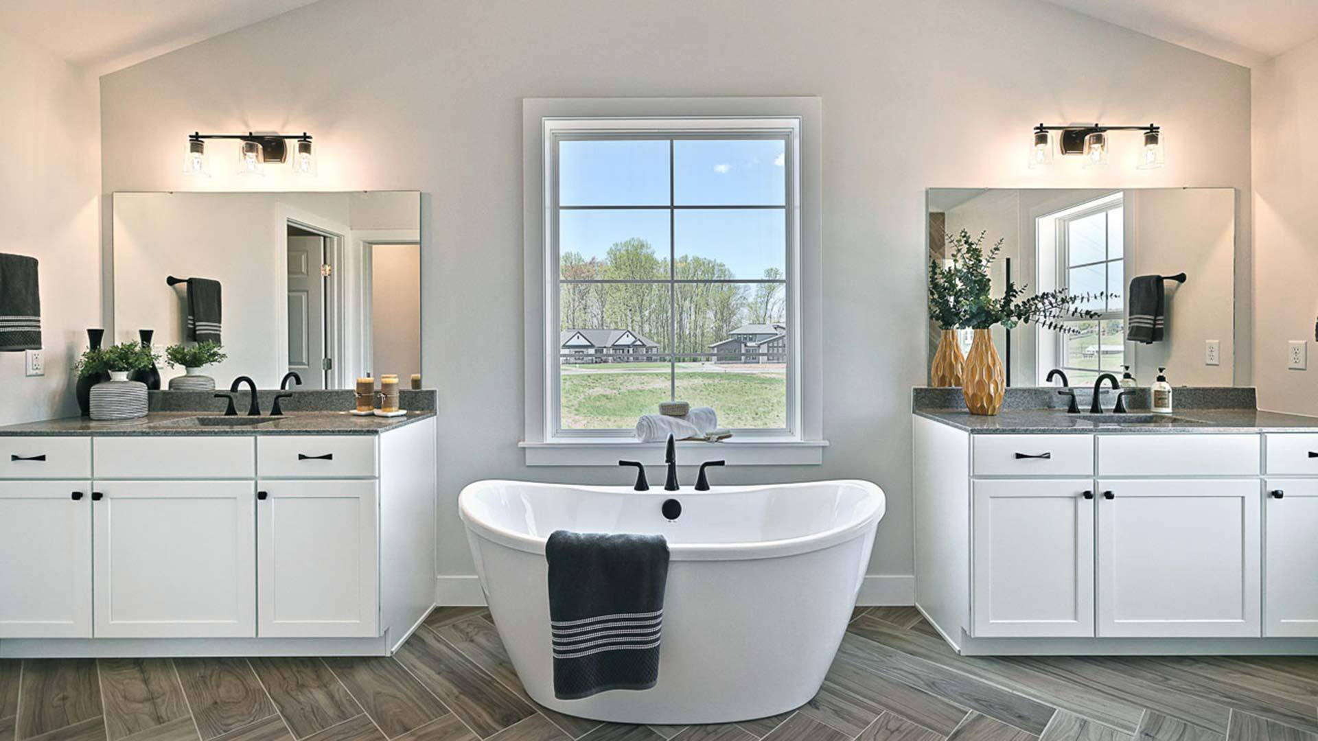 Spacious Primary Bathroom with Freestanding Tub in the Silverbrooke Customizable Home Plan Design