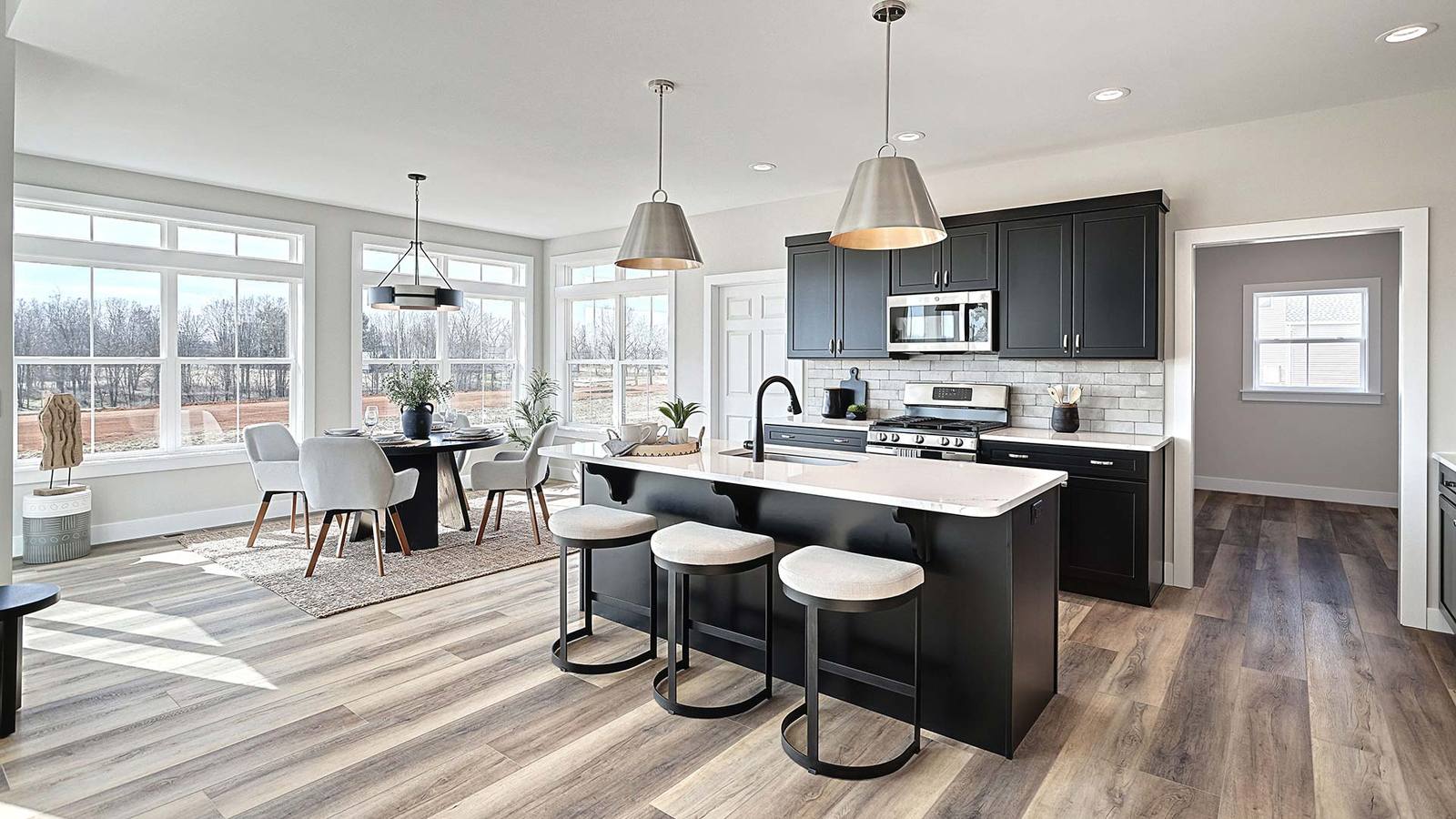 Kitchen Opens to the Breakfast Room in the Spacious Sullivan Home Plan