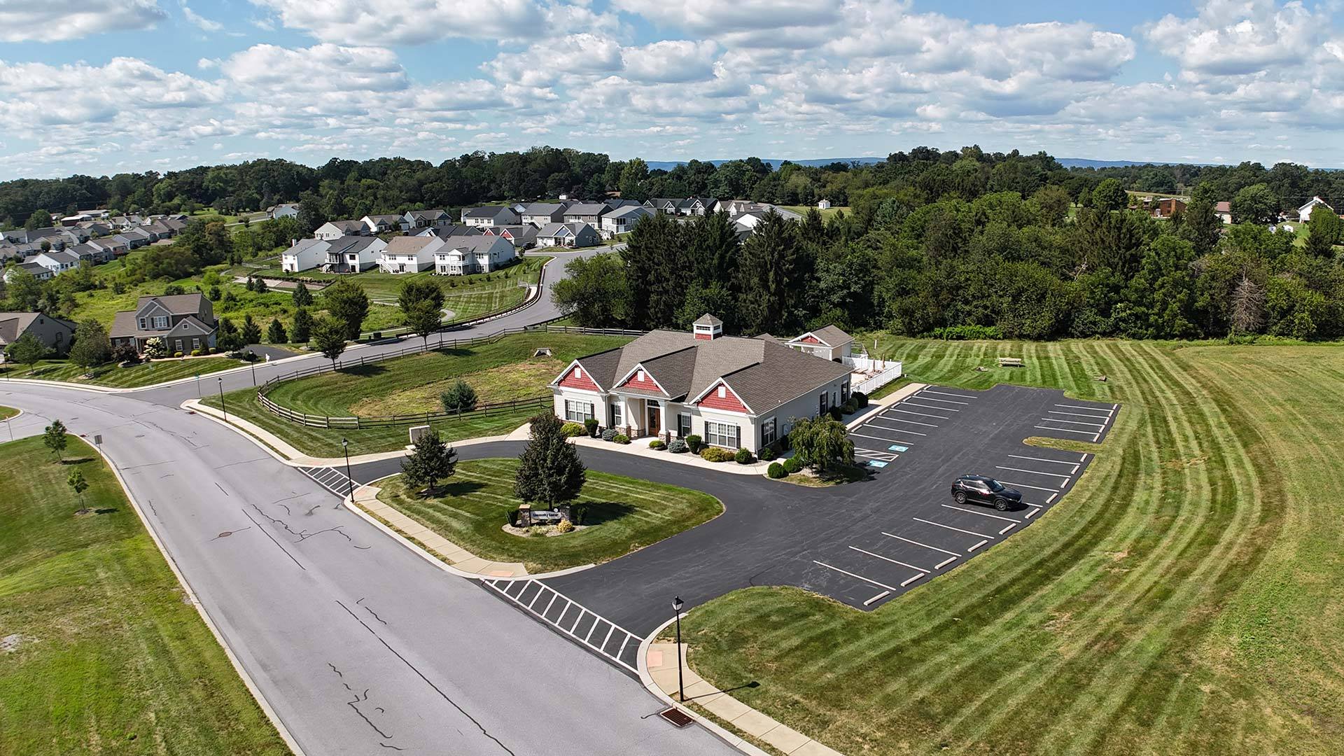 Aerial Overview of the Community Clubhouse at The Crossings at Sweetbriar 55+ New Home Community