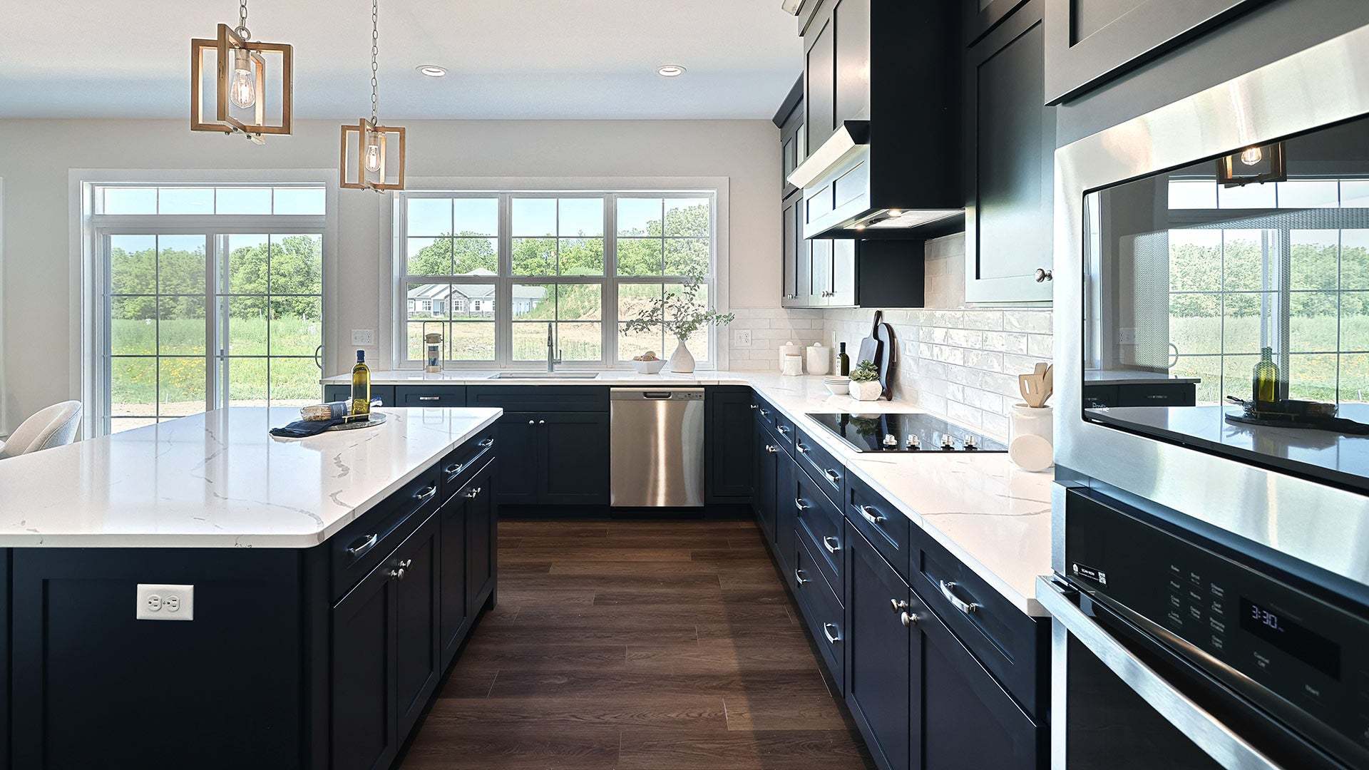 Kitchen with Triple Windows in the Customizable Kingston Home Plan in Mechanicsburg PA