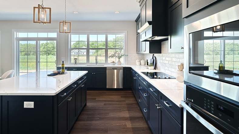 Kitchen with Triple Windows in the Customizable Kingston Home Plan in Mechanicsburg PA