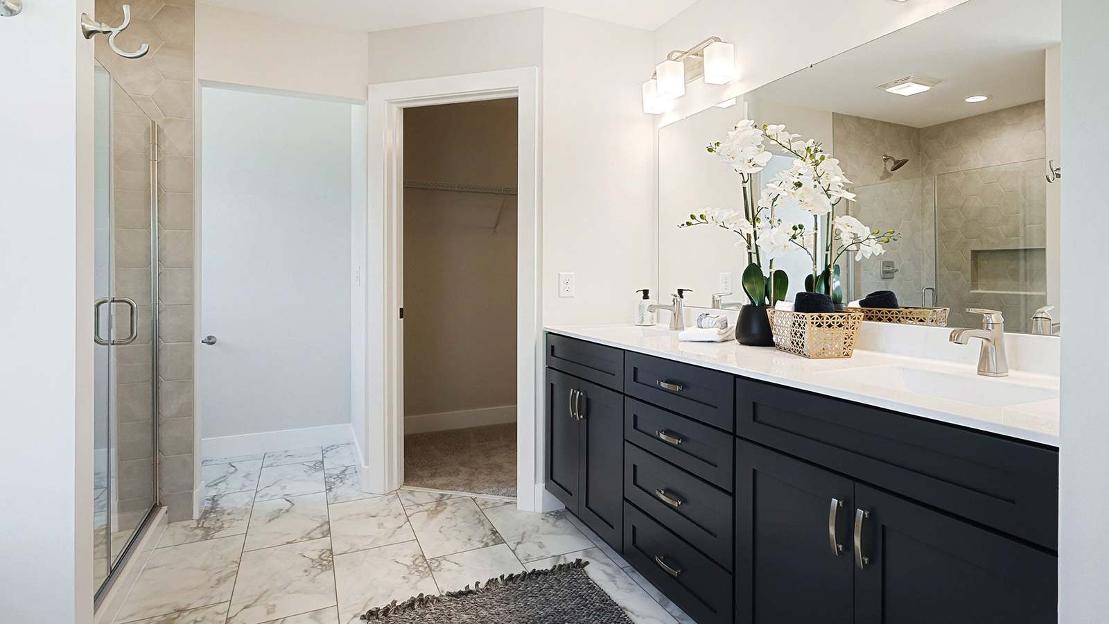 White and Wood Primary Bathroom in the Kingston New Home Plan in Mechanicsburg PA