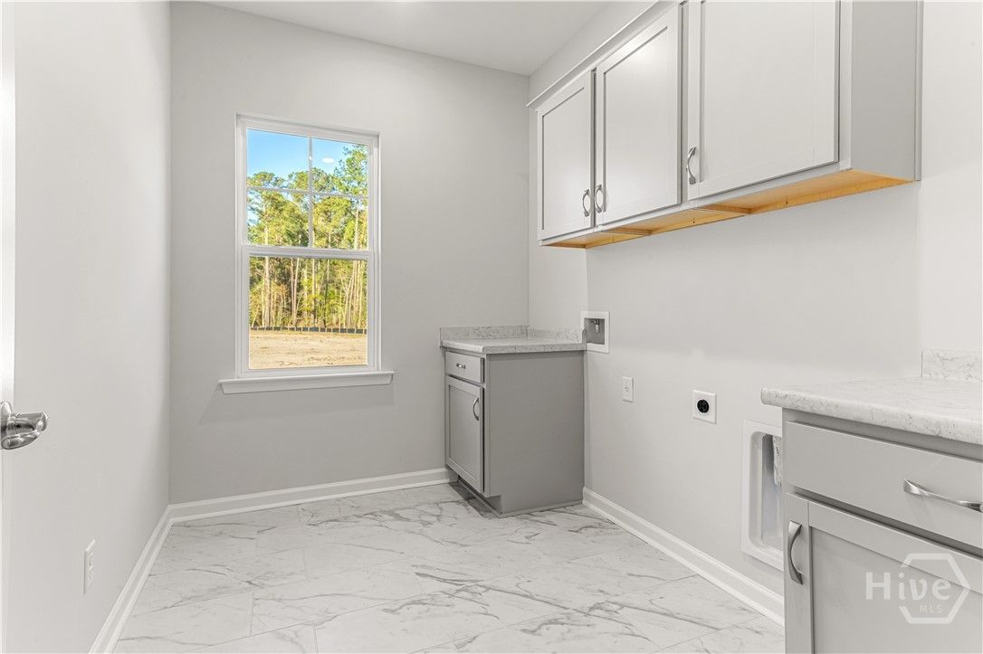 Laundry Room With Upper and Lower