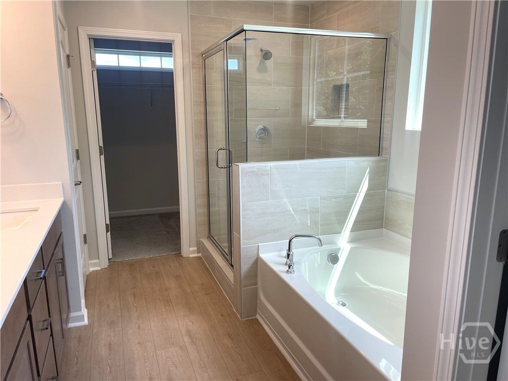 Separate Tiled Garden Tub and Walk in Shower