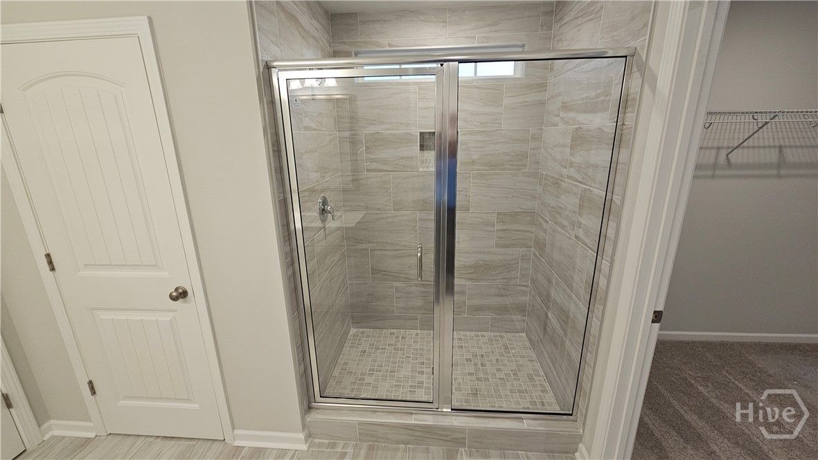 Actual Home - Tile Shower in Primary Bathroom - Fi