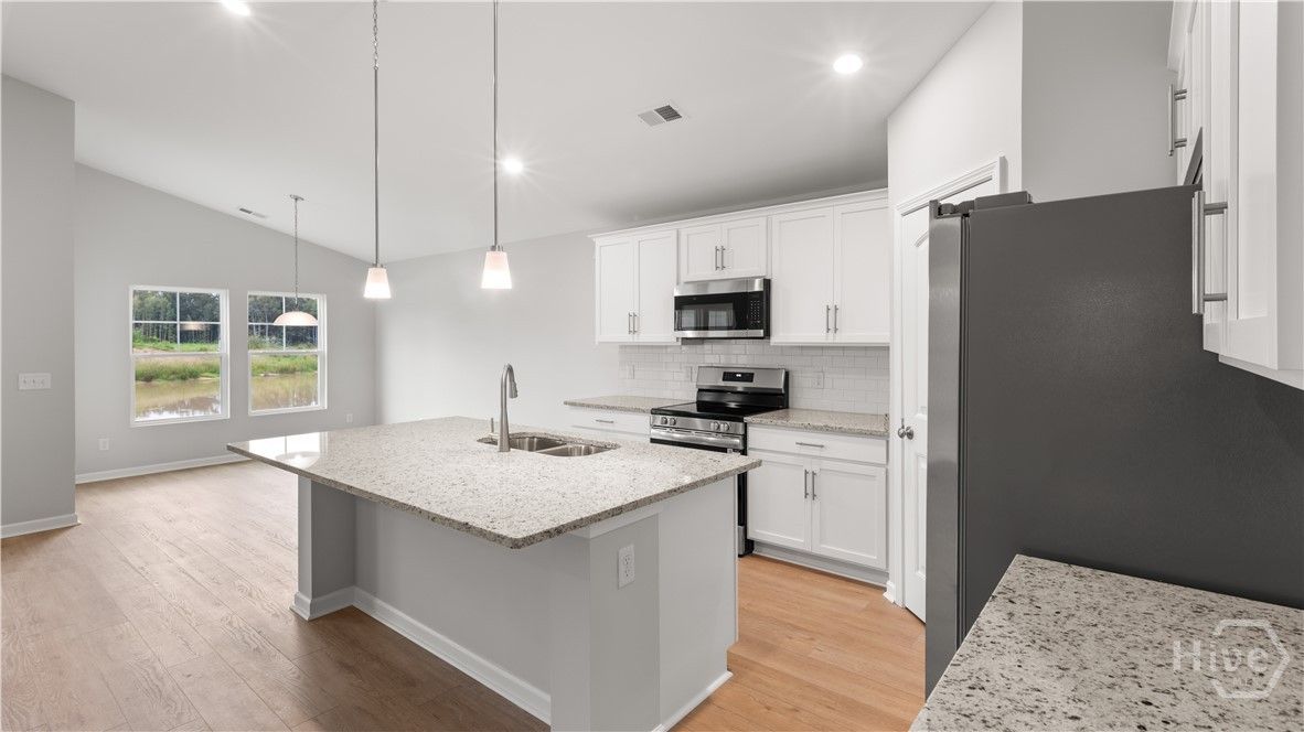 NOT THE ACTUAL HOME. Pictures are of a finished Sp