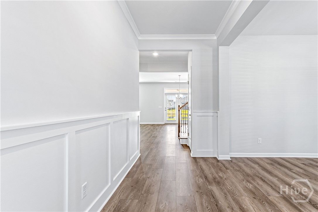 Grand Entrance With Flex Space, Wainscotting and C