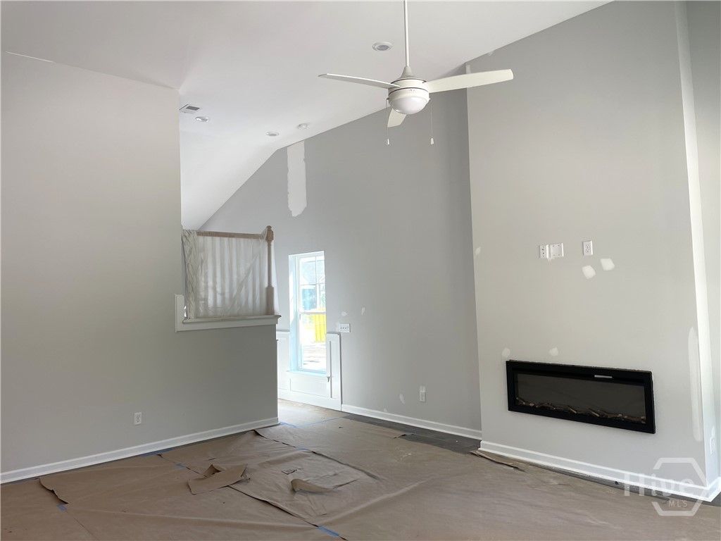 Vaulted Ceiling Family Room with Gas Fireplace