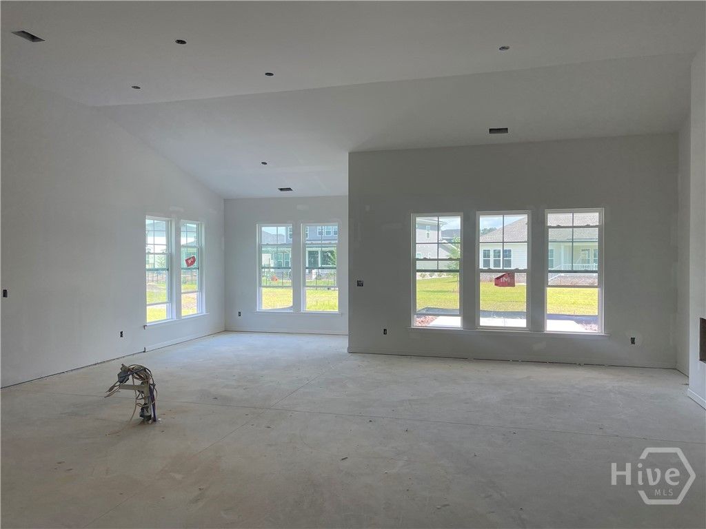 12' Vaulted Open Family Room, Dining and Kitchen.