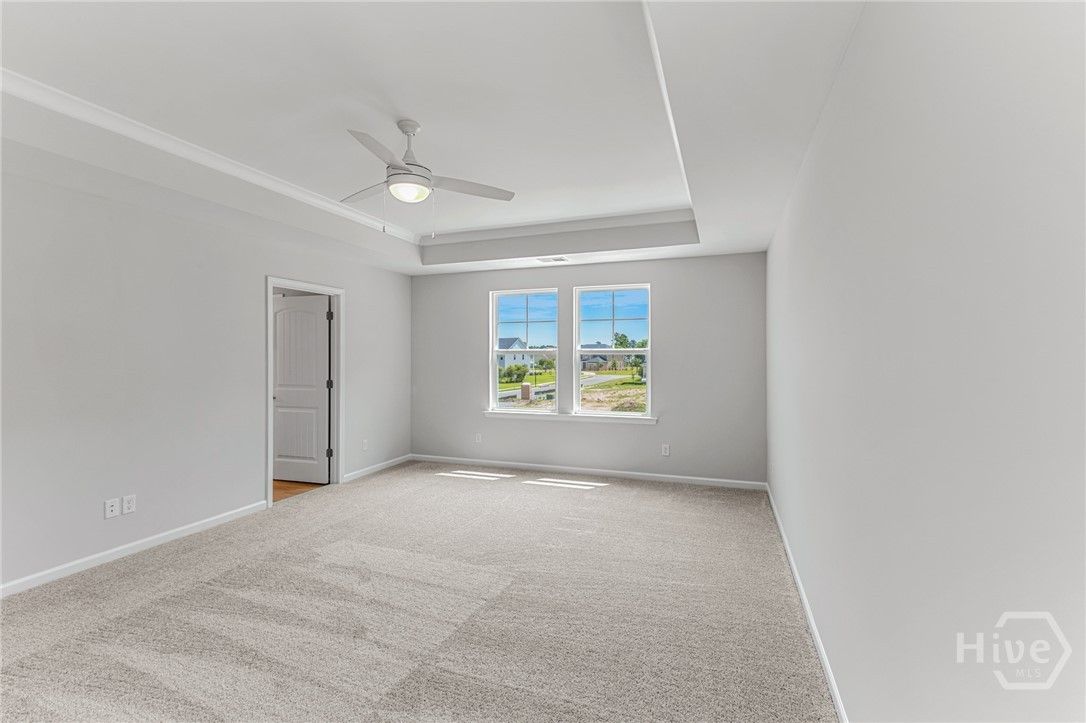 Primary Bedroom with Tray Ceiling