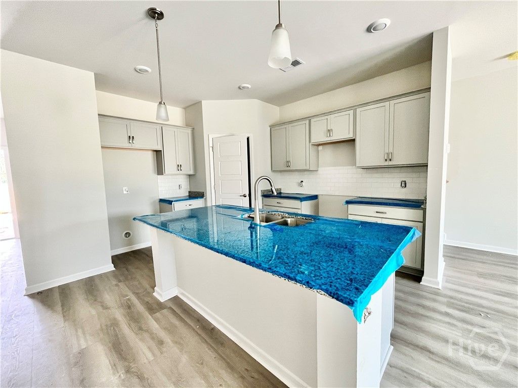 Kitchen with plenty of counter and cabinet space.