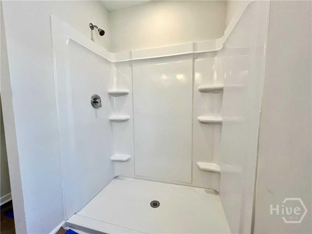 5' long shower-only in primary bathroom.