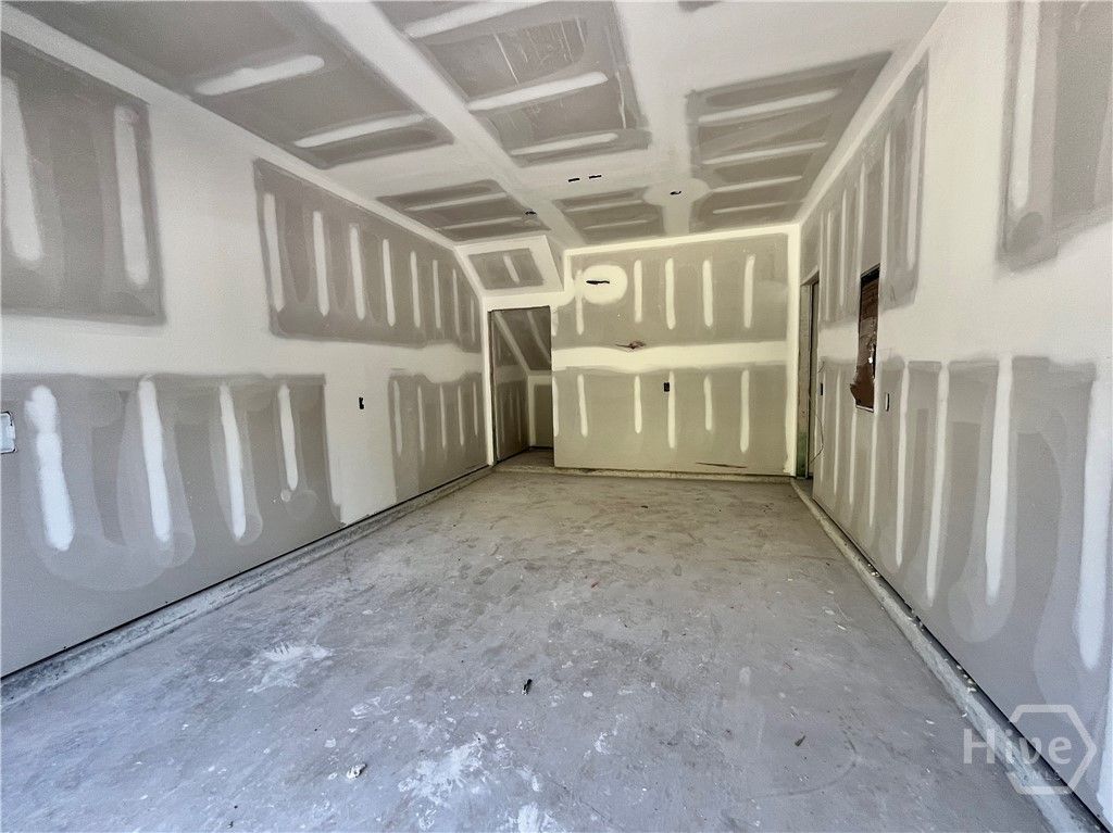 Garage. Photo taken 7.8.26. HOME IS UNDER CONSTRUC