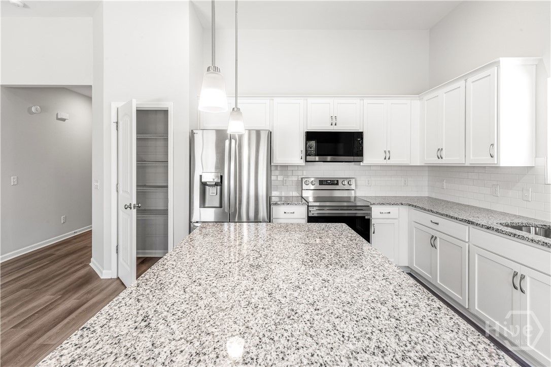Kitchen Island with Open Pantry Door
