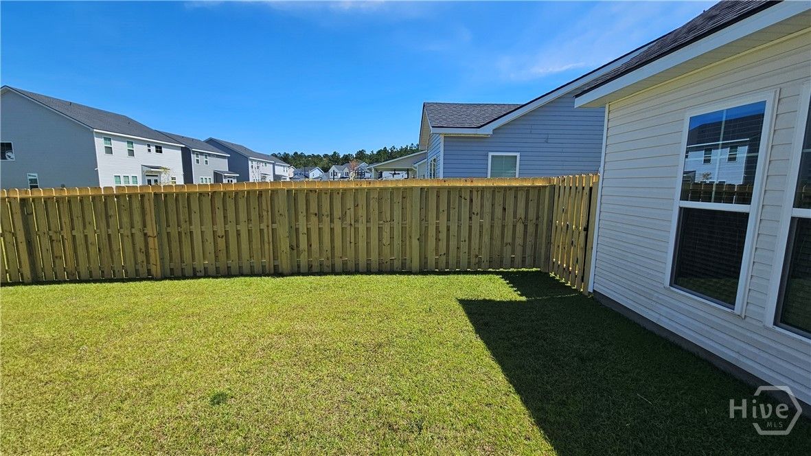 FULLY FENCED BACK YARD