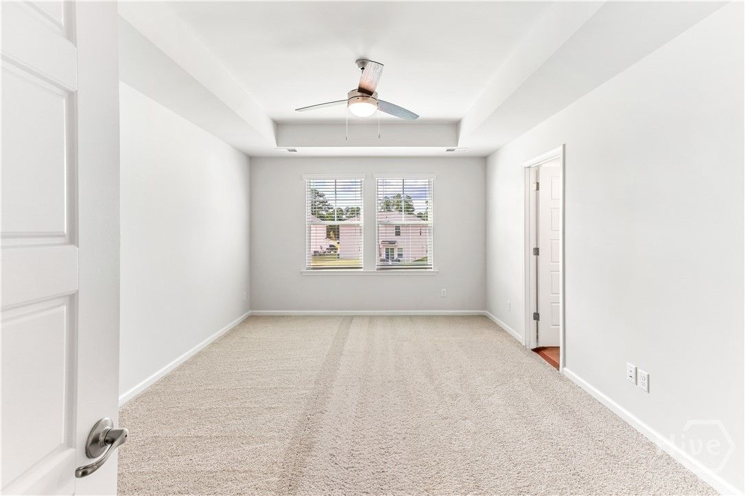 Primary Bedroom - Tray Ceiling with Fan