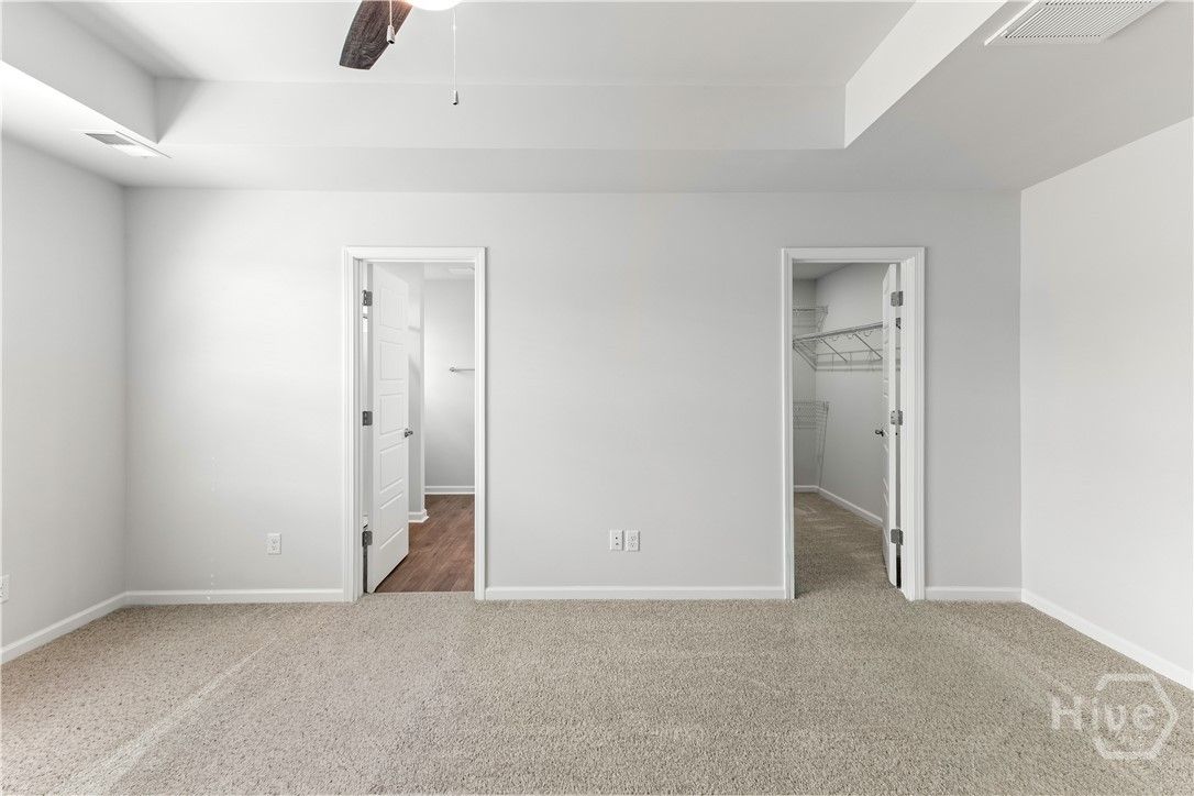 Primary Suite  - Walk In Closet and Bath